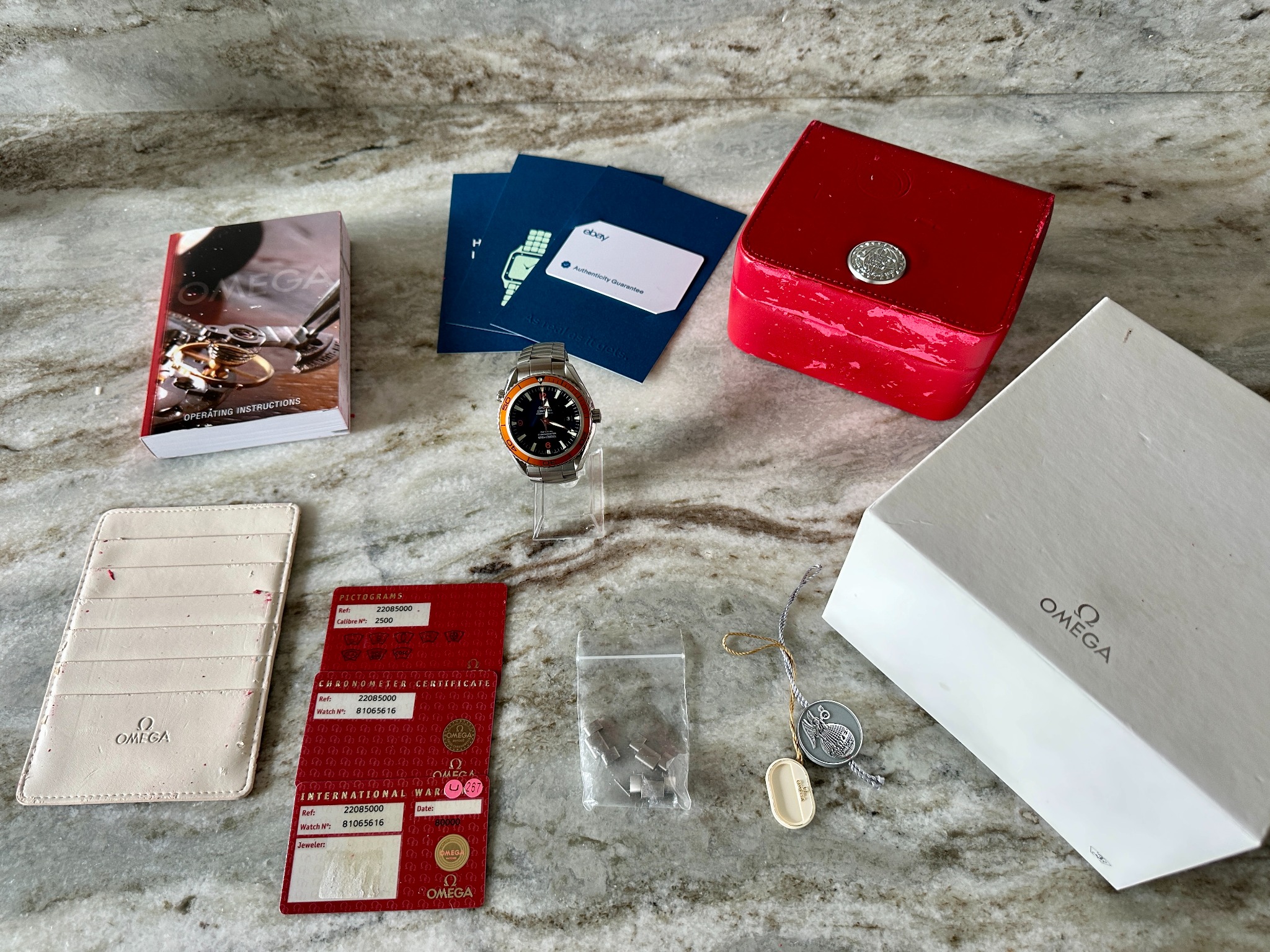 Omega watch with box and papers